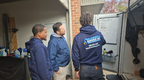 three McDaniel technicians