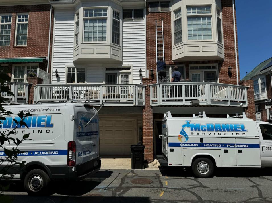 McDaniel Vans in front of brick building